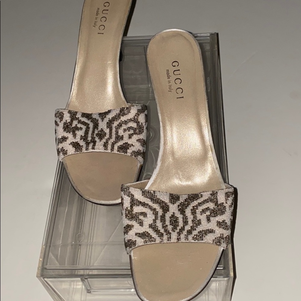 Slides of the Gucci kind